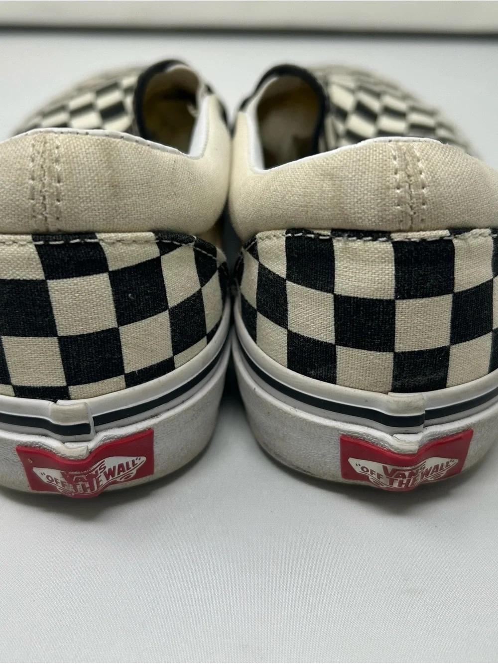 Vans Slip-On Checkerboard Canvas Sneakers in Black and White